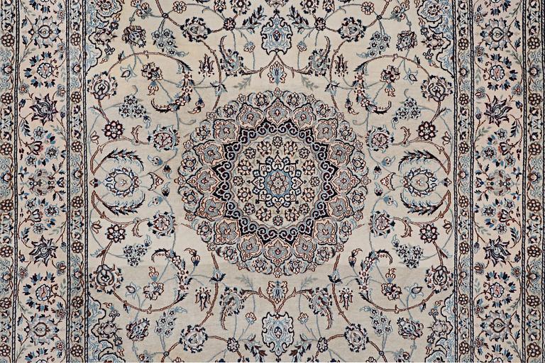 A carpet, Nain, part silk, 9 laa, ca 302 x 203 cm.