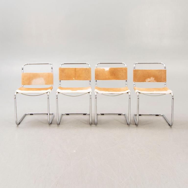 A set of four Italian chrome and cow skin later part of the 20th century.
