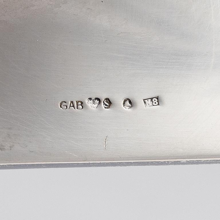 A pair of Swedish silver candlesticks, bearing the mark of GAB Stockholm, 1934.