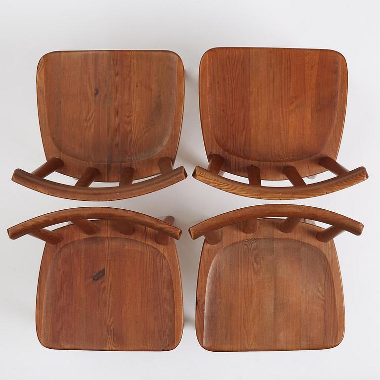 Axel Einar Hjorth, a set of four stained pine "Utö" chairs, Nordiska Kompaniet, Sweden, 1930s.