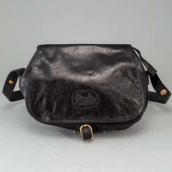 CÉLINE,a black leather handbag.