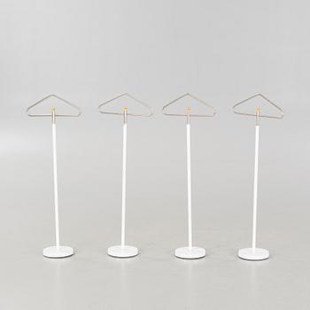 Four coat-hangers from the second half of the 20th century.