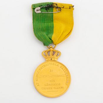 A Swedish gold medal, 18 carat.