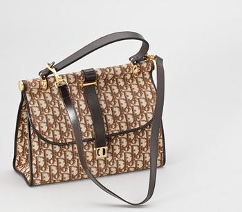 1426. A brown monogram canvas handbag by Christian Dior.