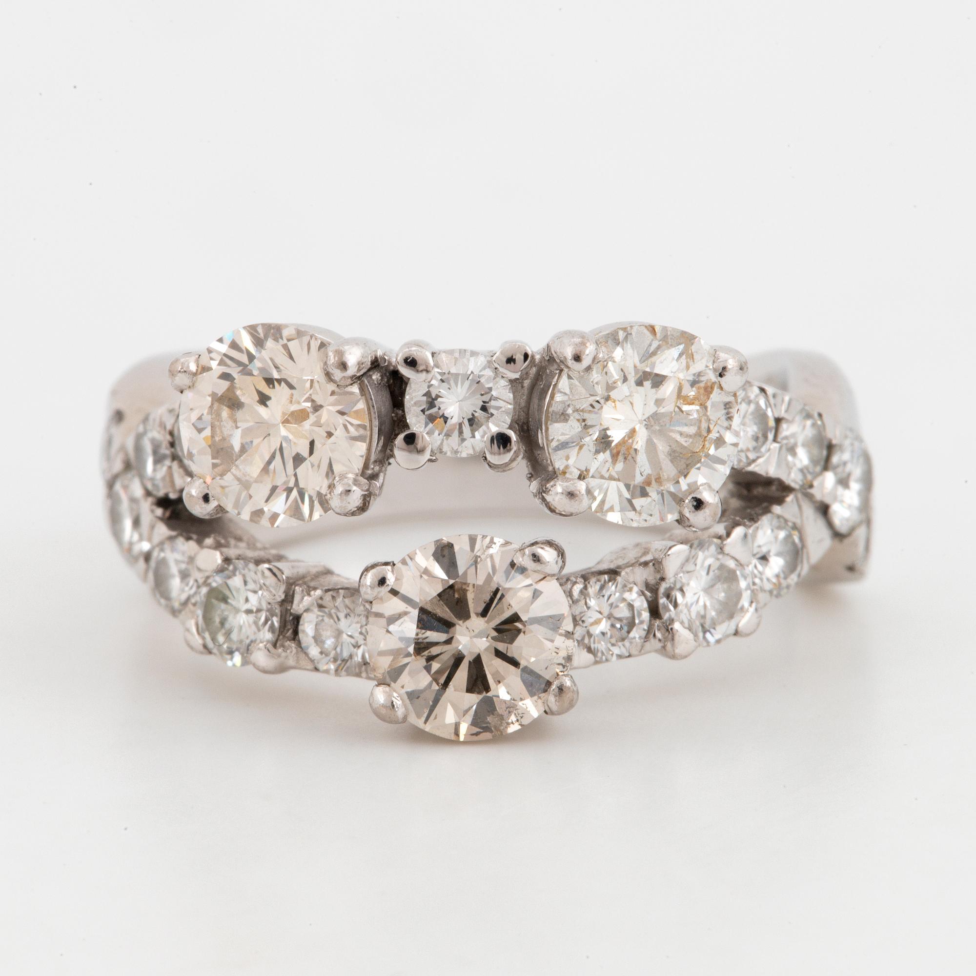 Round brilliant-cut diamond ring.