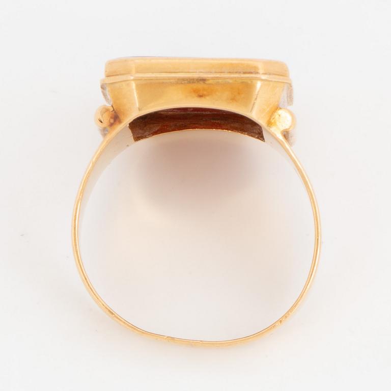 Carnelian signet ring with coat of arms.