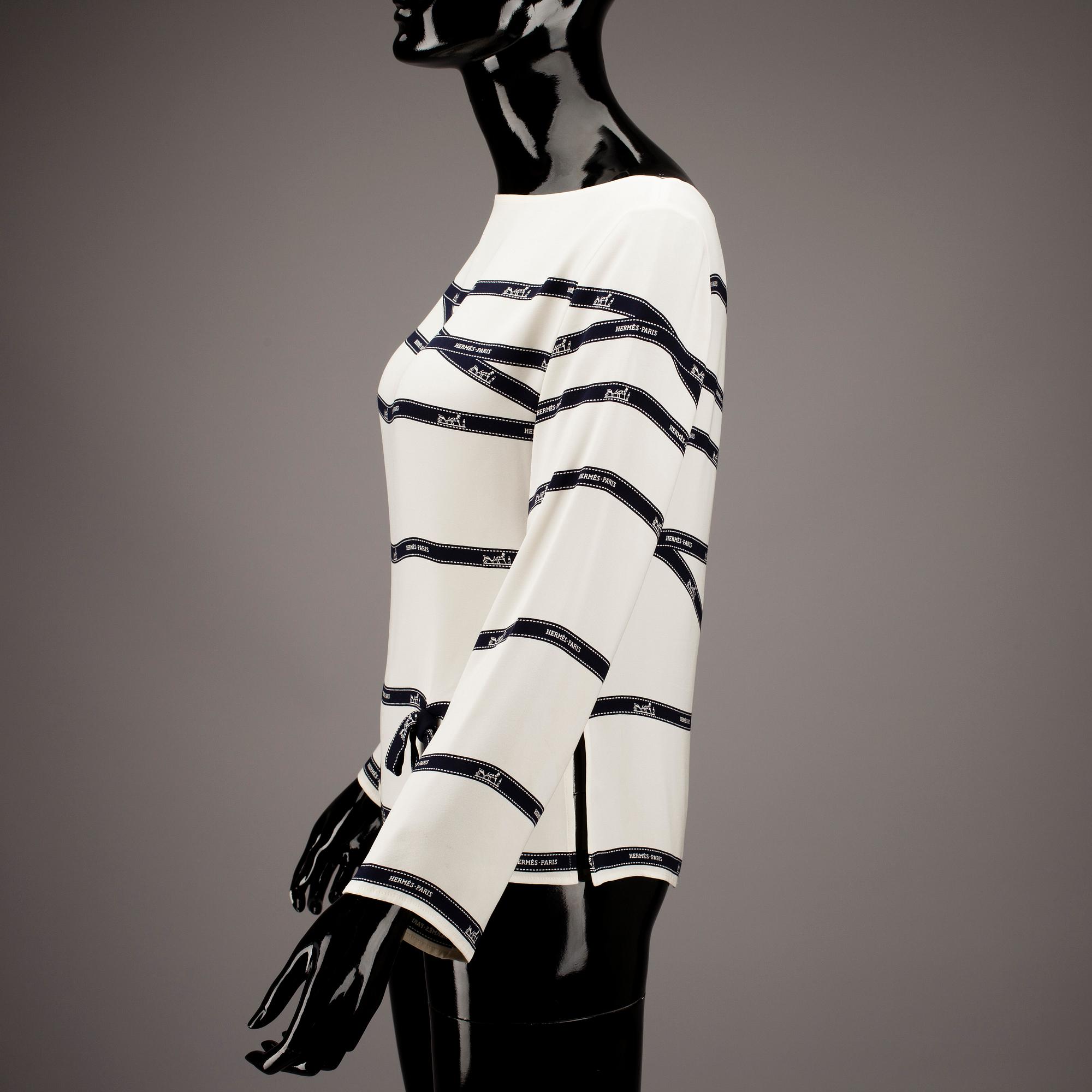 BLUS, Hermès.