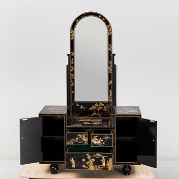 A Chinese lacquered dressing table and stool, 20th century.