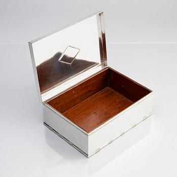 Johan Rohde, a sterling silver cigar box with wood interior, Georg Jensen, Copenhagen 1925-1932, design no. 329B.