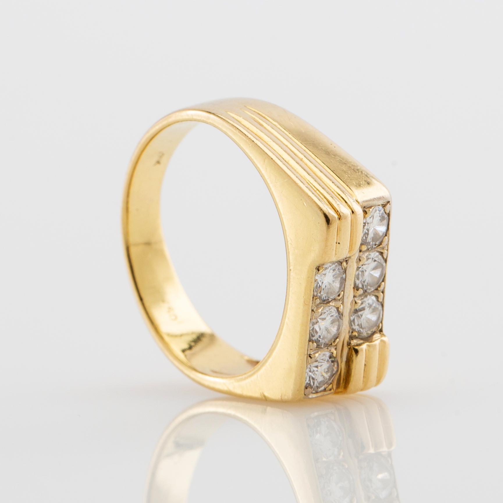 Ring, 18k gold with brilliant-cut diamonds, known as a "claw ring".