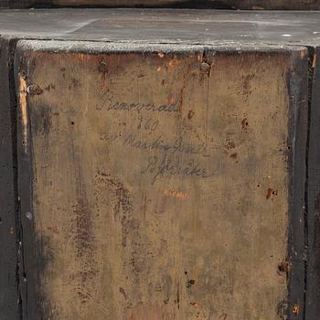 An 18th century corner cabinet.