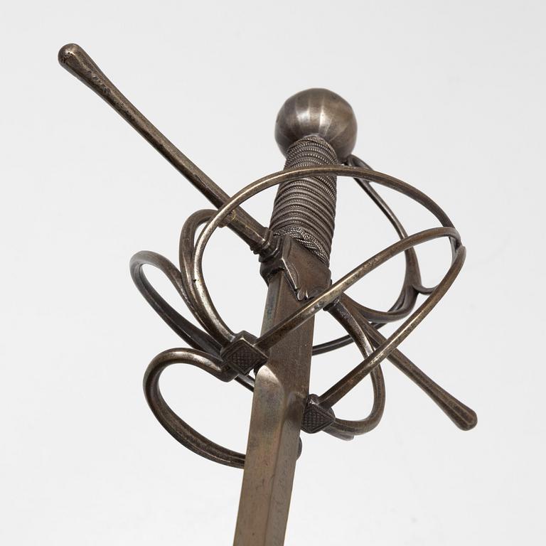 A 17th Century swept hilt rapier.