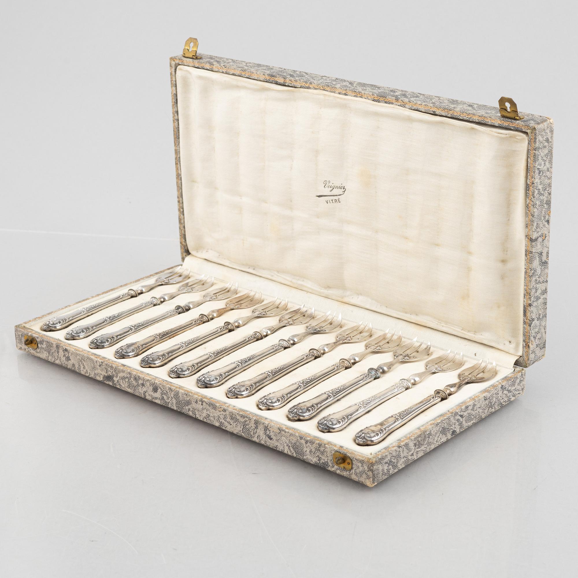 A set of twelve French silver oyster forks, mark of Louis Coignet