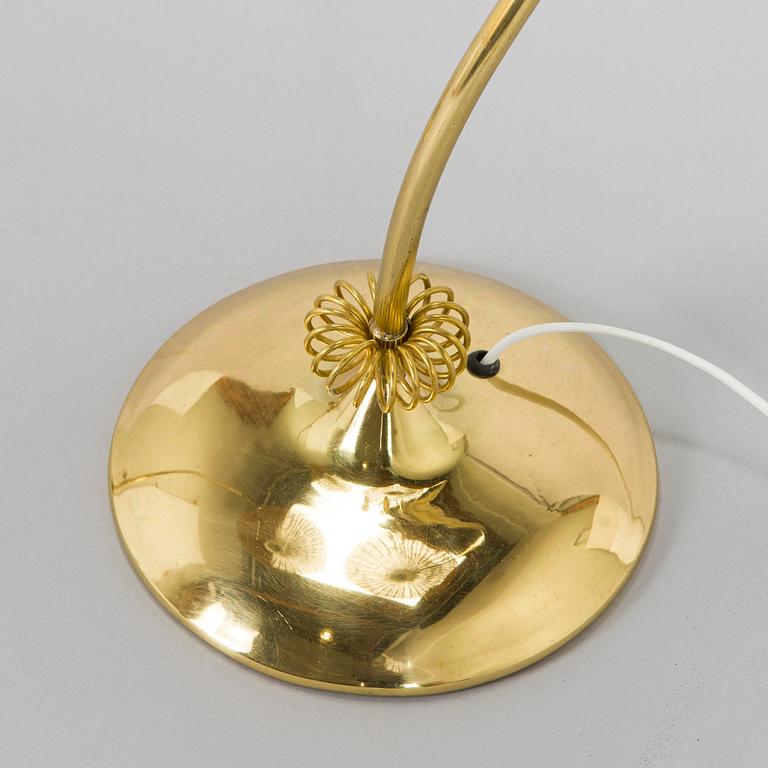 A pair of mid-20th century floor lamps.