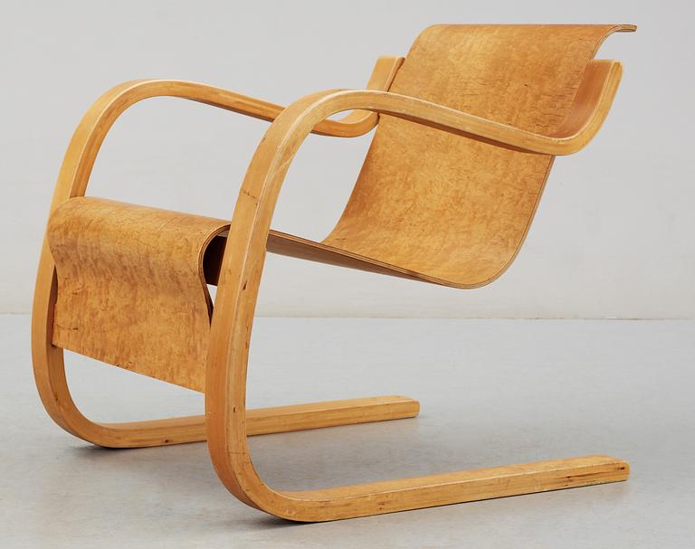 An Alvar Aalto birch armchair by O.y Huonekalu-ja Rakennustyötehdas A.B,