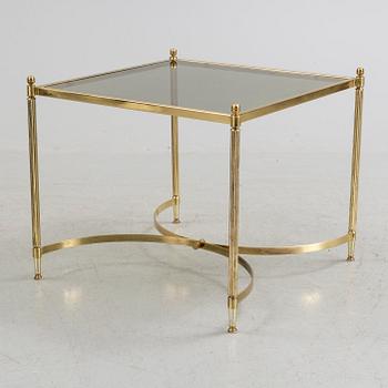 A brass and glass coffee table from the second half of the 20th century.