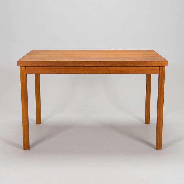 A mid-20th century dining table.