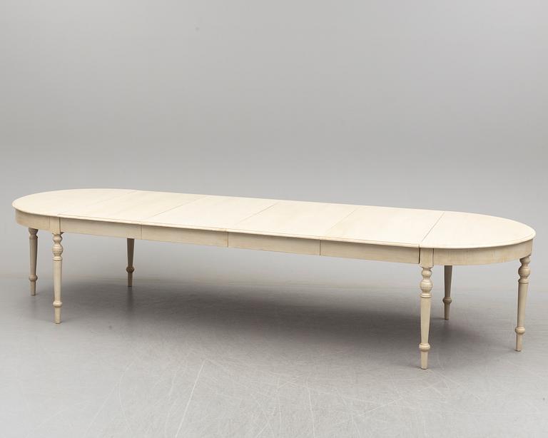 A late 19th century painted dining table.