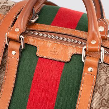 GUCCI, a bag.