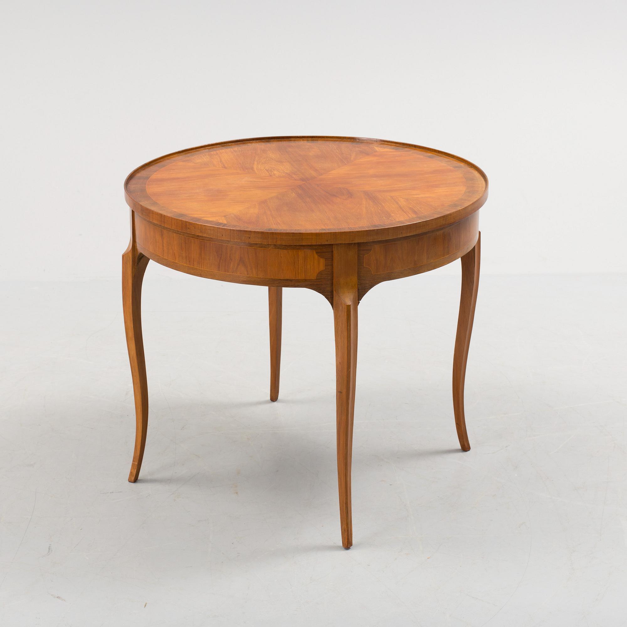 An early 20th century, 'Empire' style drawing room table.