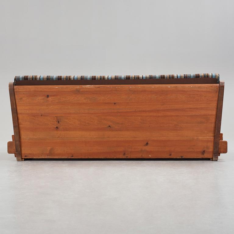 Axel Einar Hjorth, a stained pine "Lovö" sofa, Nordiska Kompaniet, Sweden 1930's.