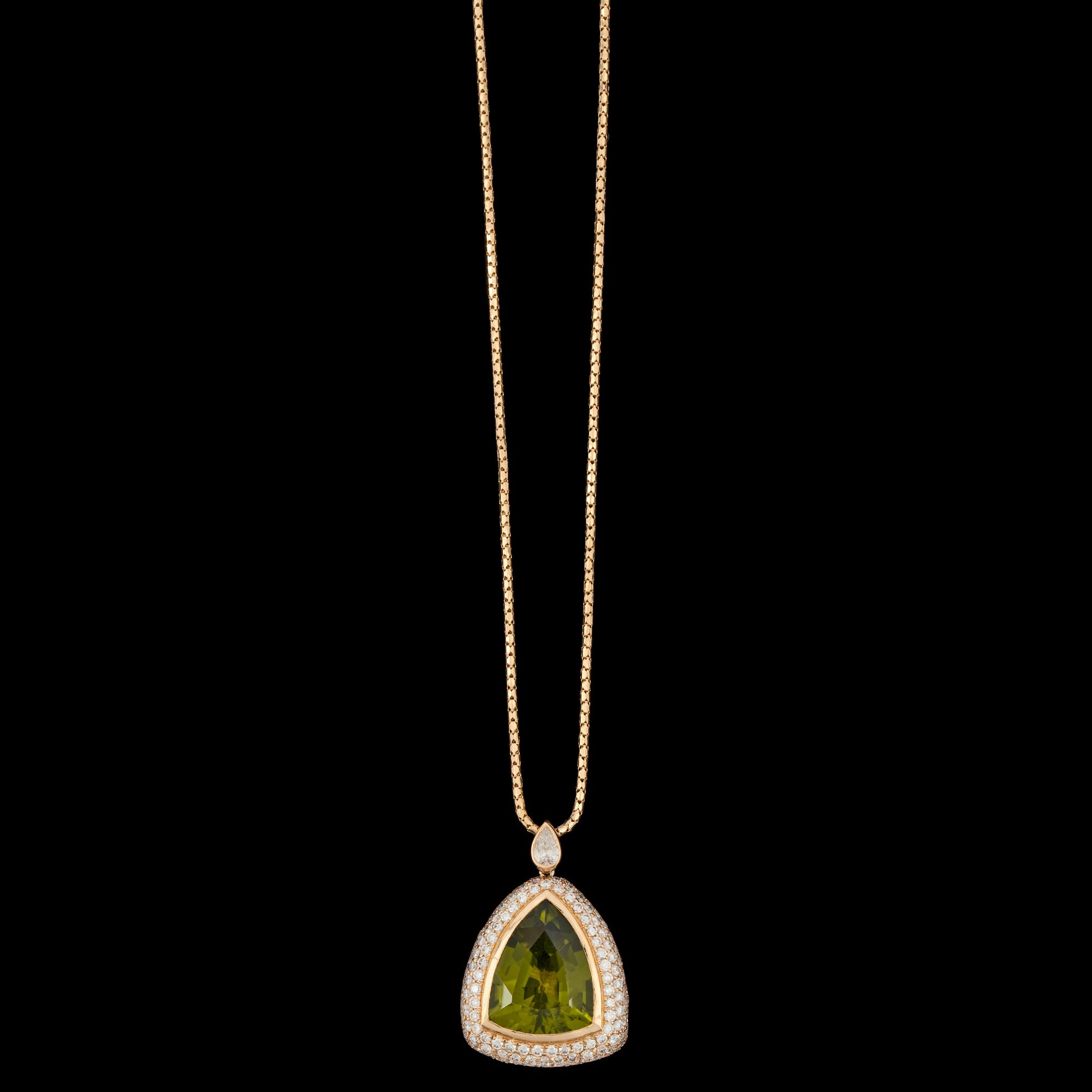 A peridote, 7.84 ct and brilliant cut diamond pendant, tot. 2.09 cts.