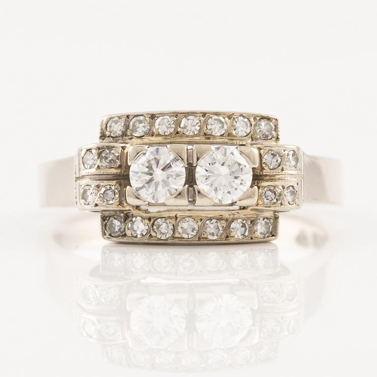 Ring in 18K white gold set with round brilliant-cut and eight-cut diamonds.