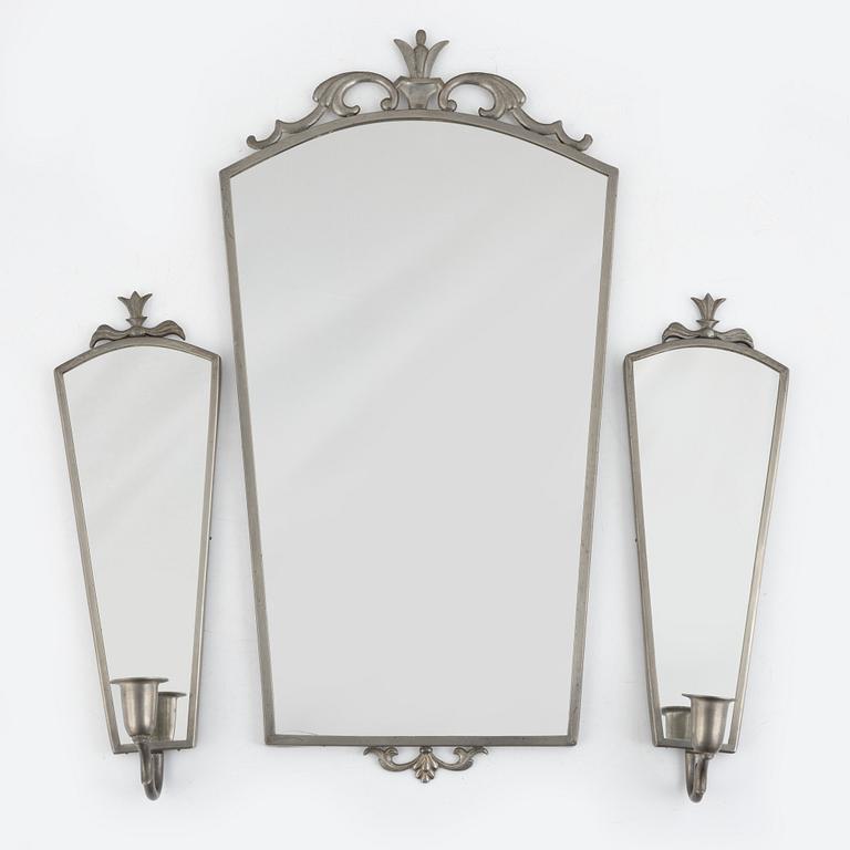 A Swedish Grace mirror and a pair of wall sconces, 1920's/30's.