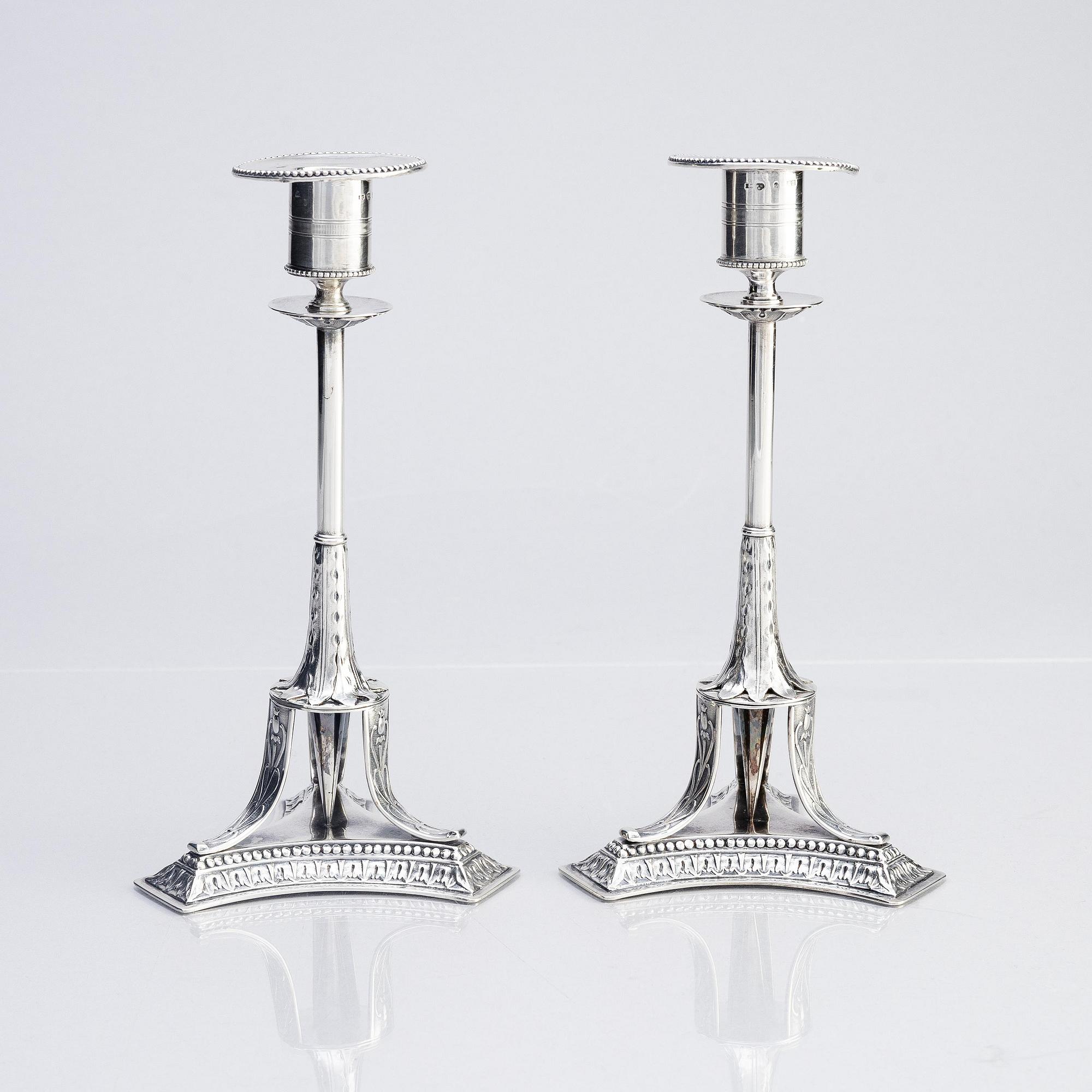 A pair of Swedish early 19th century silver candlesticks, marks of Adolf Zethelius, Stockholm 1817.