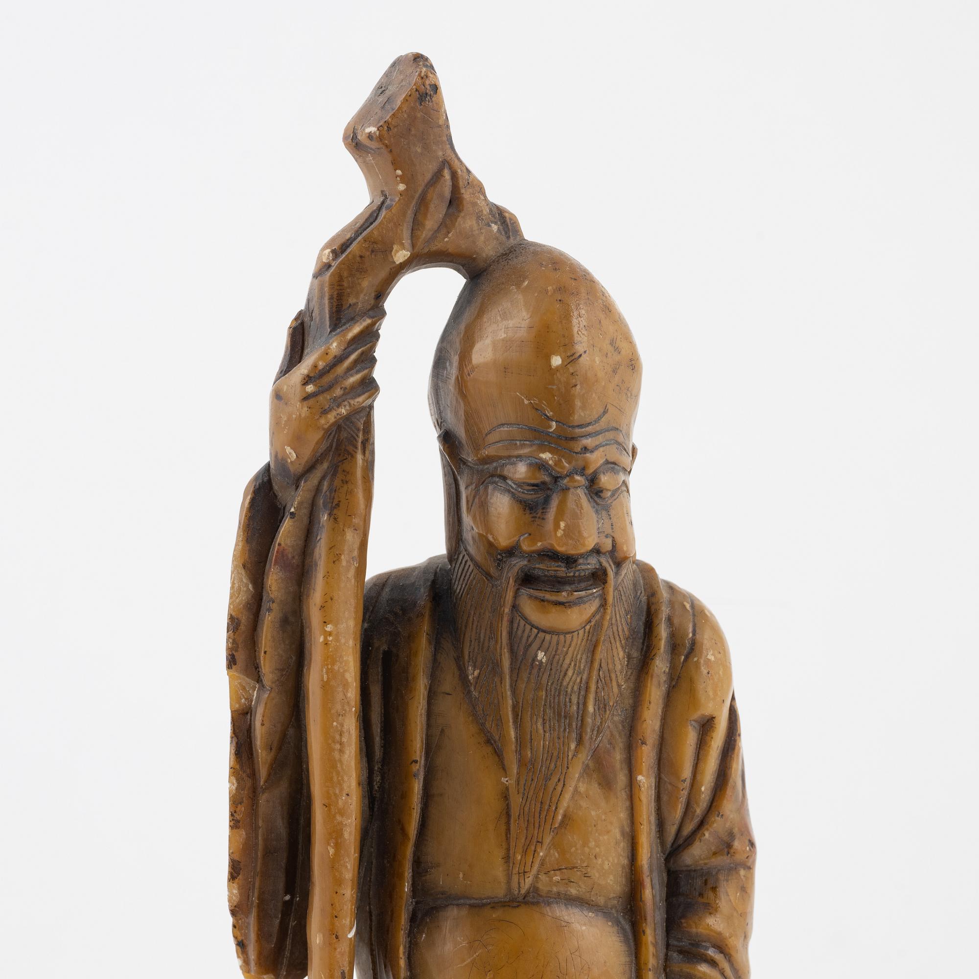 A soapstone figure of sholaou, China, 20th Century.