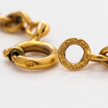 Tapio Wirkkala, "Viikinkiriipus", 14K kultaa, Westerback, Helsinki 1971.