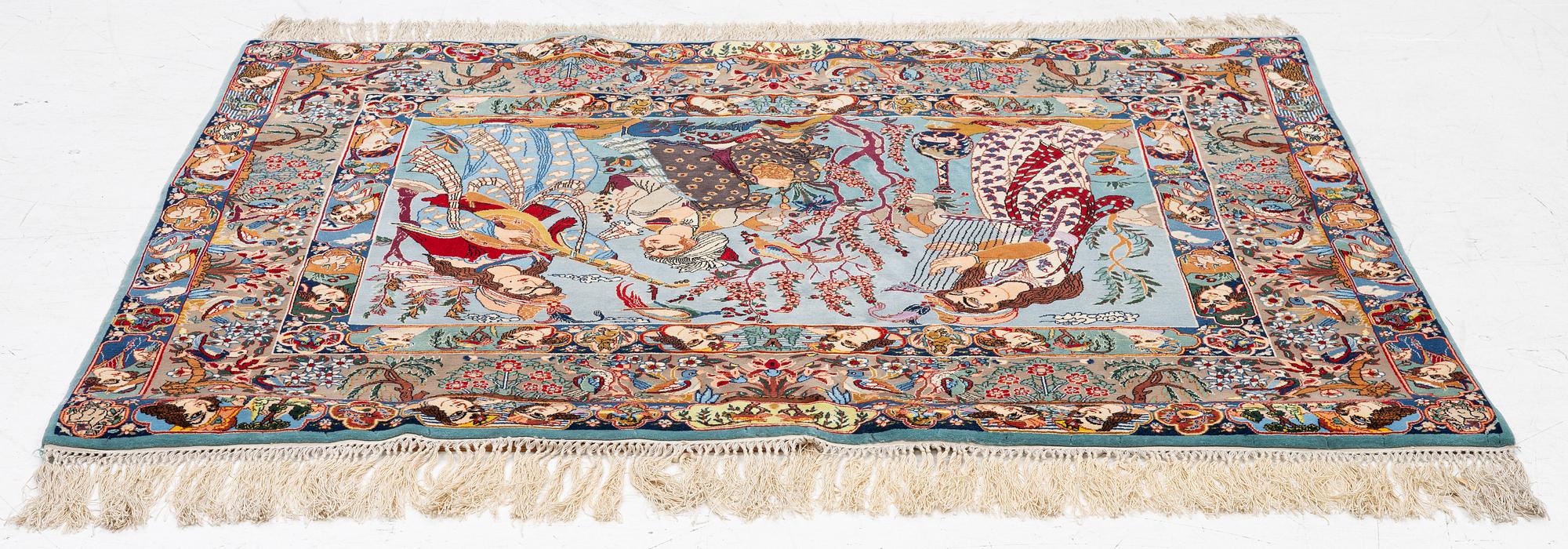 An Isfahan figural rug, c. 112 x 148 cm.