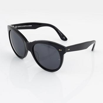 Oliver Goldsmith, a pair of black "Manhattan" sunglasses.