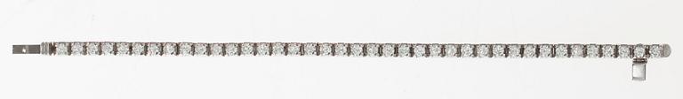 RANNEKORU, 18K valkokultaa. Briljanttihiottuja timantteja n. 5.50 ct. H/vs. Ruotsi 1969. Pituus 18 cm. Paino 26,2 g.