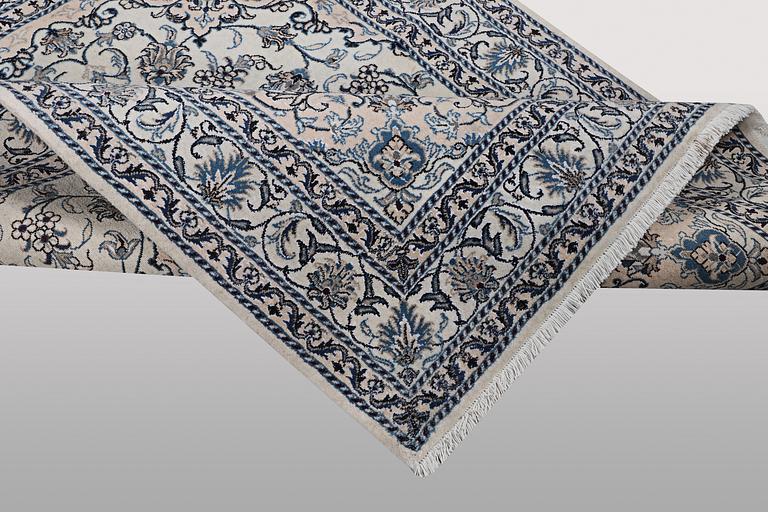 A rug, Nain, part silk, ca 200 x 154 cm.
