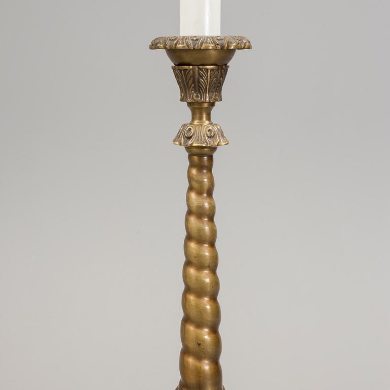 a early 20h Century brass floor lamp.