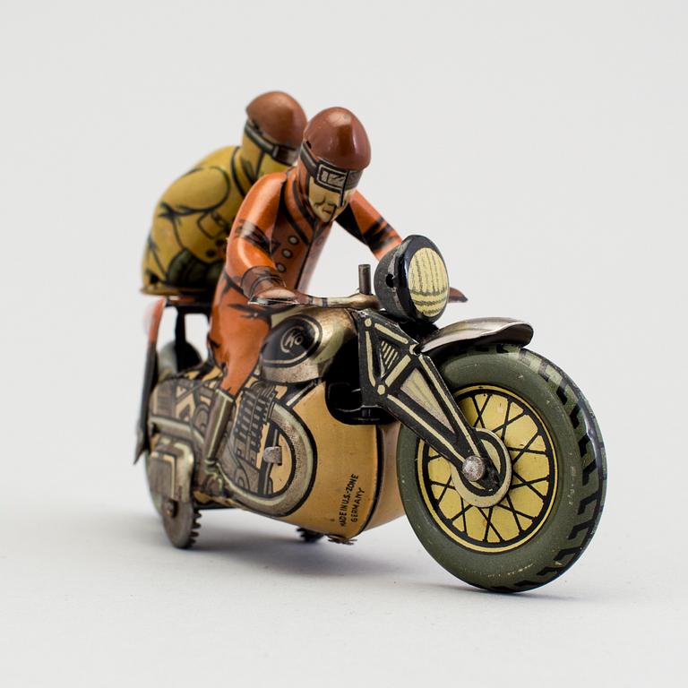 A tinplate Kellerman military motorcycle 353, Germany c. 1950.