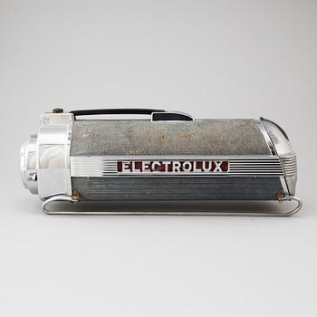 A model 30 vacuum cleaner by Lurell Guild, Electrolux, USA, 1937.