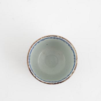 A Chinese porcelain cup, Qing dynasty, 18th century.