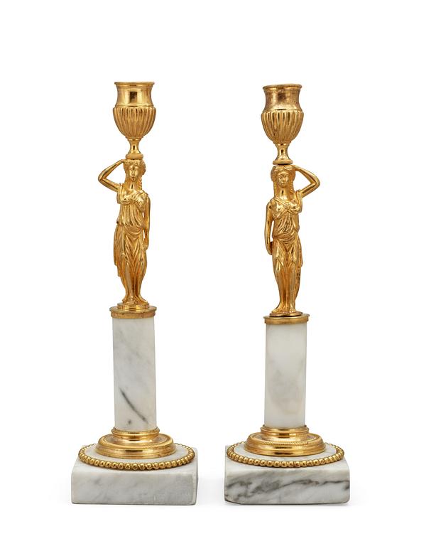 A pair of late Gustavian circa 1800 candlesticks.