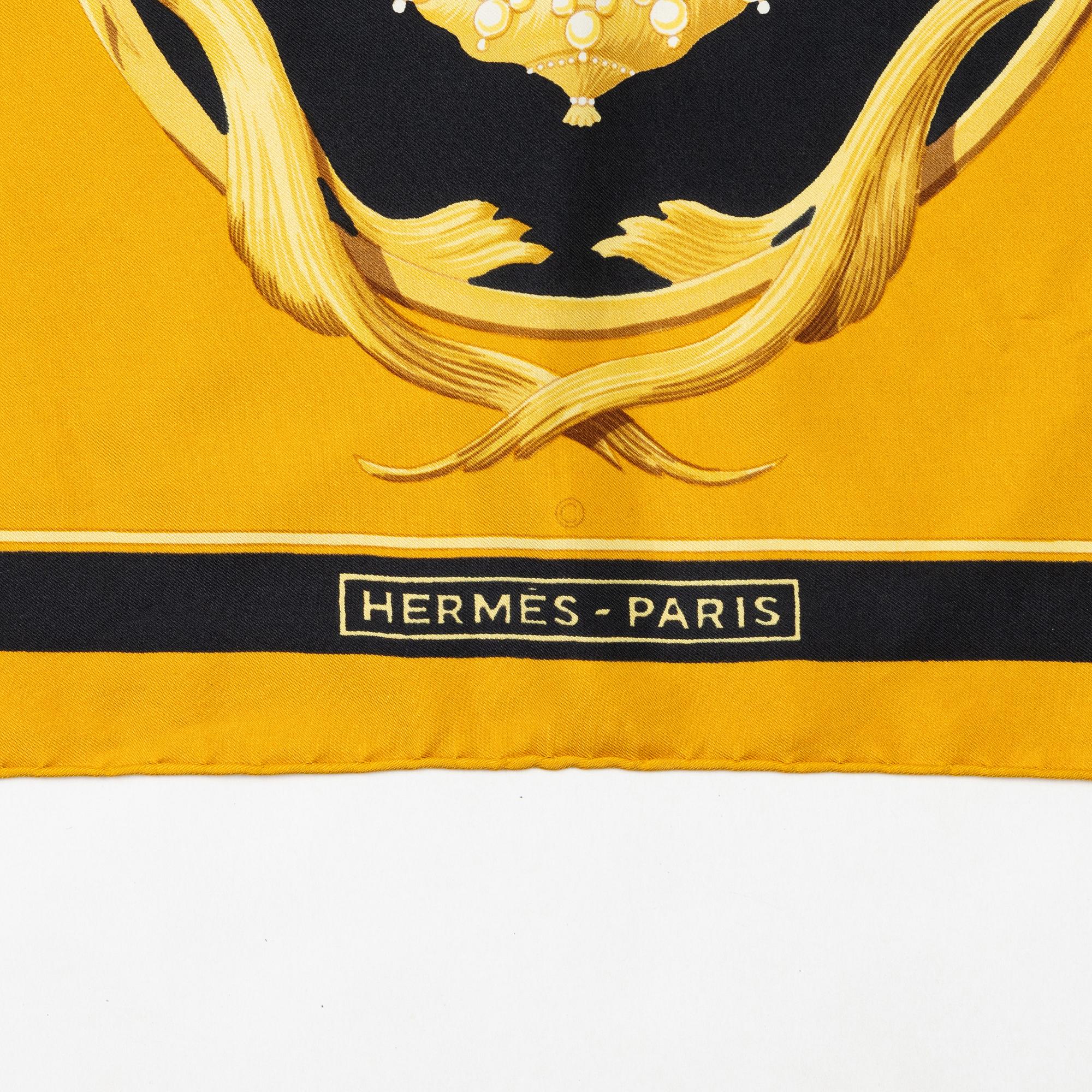 Hermès, three twill silk scarves.