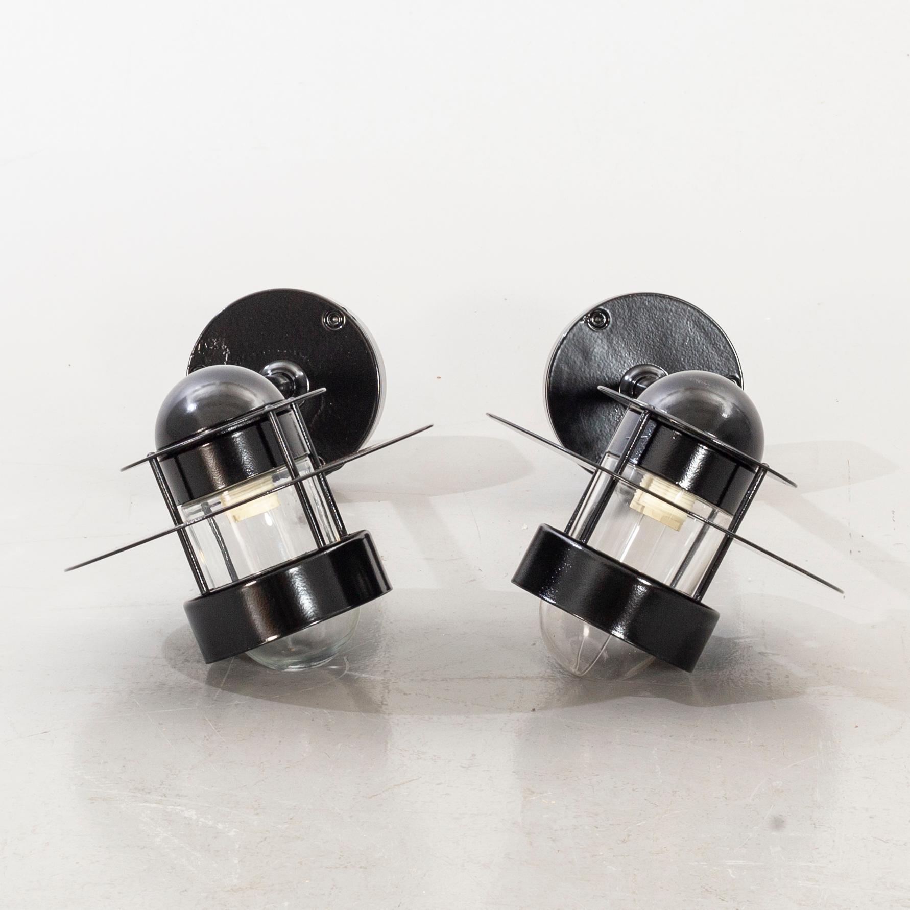 A pair of LOUIS POULSEN outdoor walllamps. second half of the 20th century.