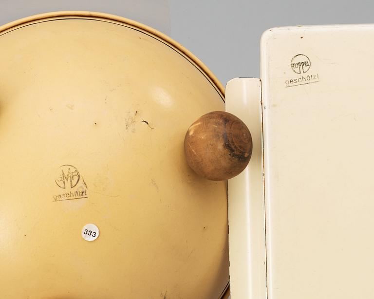 A Marianne Brandt enameled metal tray and a lidded bowl, Ruppelwerk Metallwarenfabrik, Gotha, Germany circa 1932.