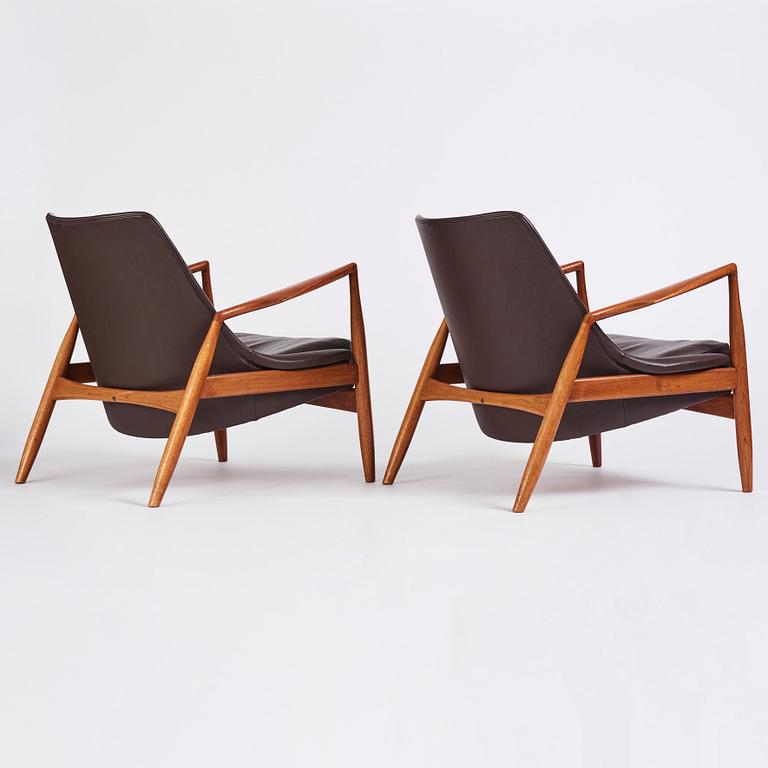 Ib Kofod-Larsen, a pair of "Sälen" dark brown leather chairs, Olof Perssons Fåtöljindustri (OPE), Jönköping.