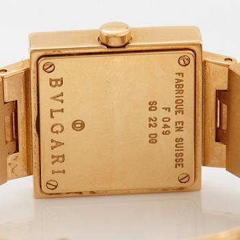 Bulgari damarmbandsur 18K guld med trappslipade rubiner och runda briljantslipade diamanter.