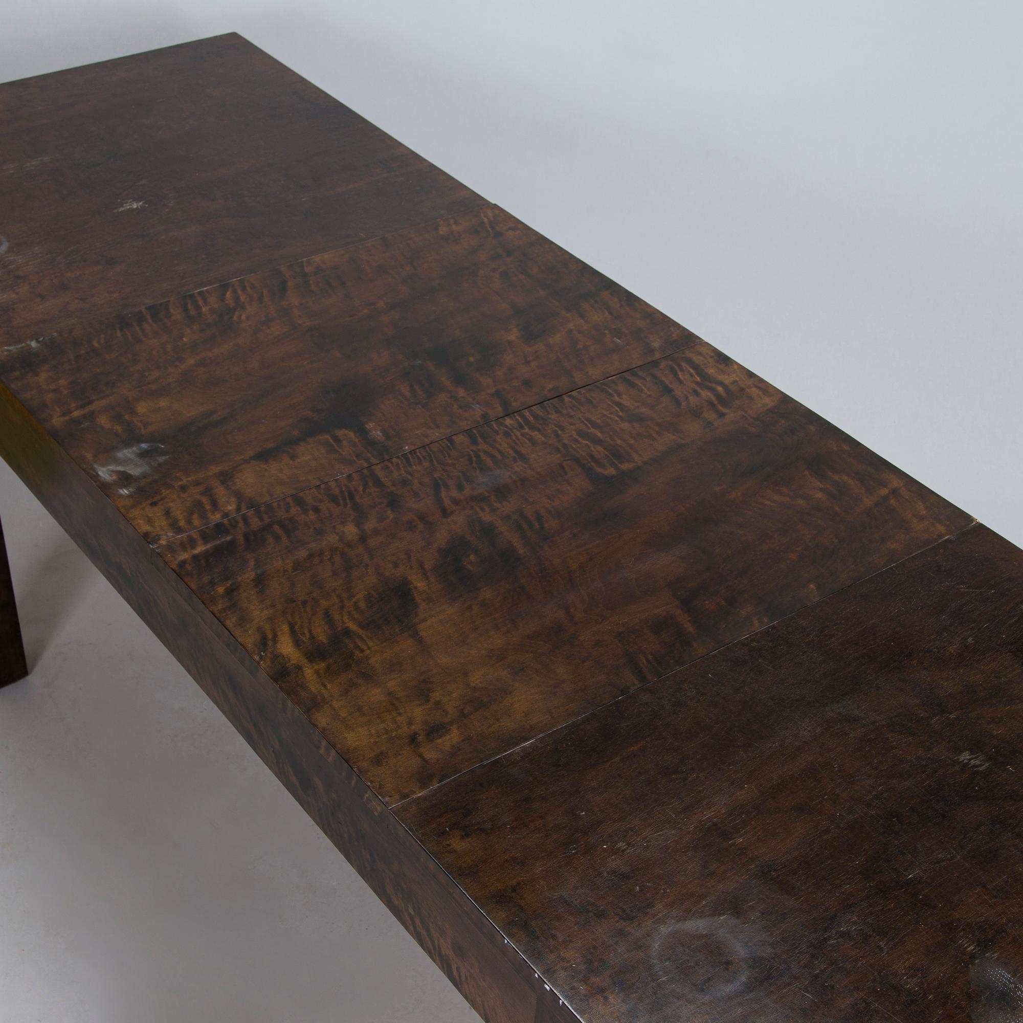 A Finnish 1930s dining table and eight chairs.