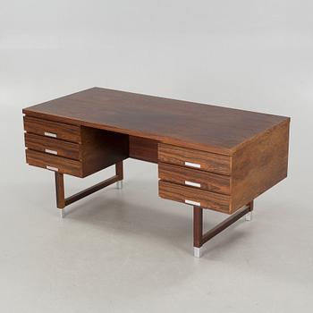 An "EP 401" writing desk, designed by Kai Kristiansen for Feldballes Møbelfabrik in Denmark, 1960/70s.