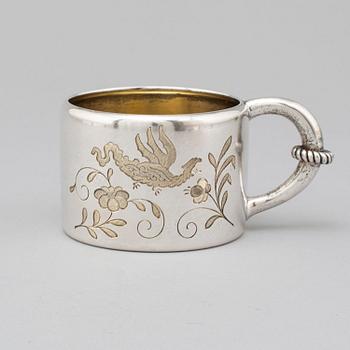 A Russian 19th century parcel-gilt silver mugg, mark of Mikhail Gratchev, St. Petersburg 1895. Imperial Warrant.