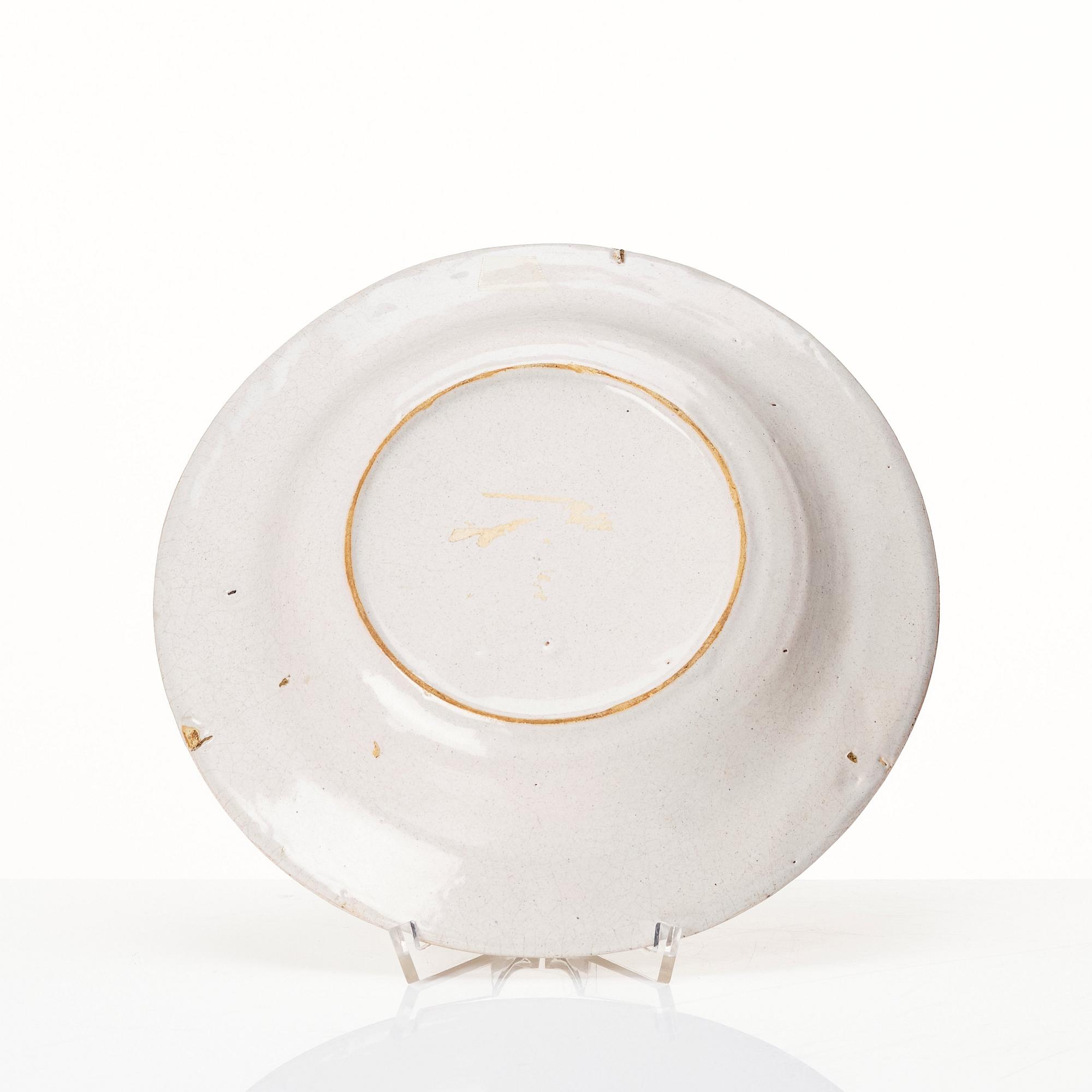 A Swedish faience dish and a plate, 18th Century.