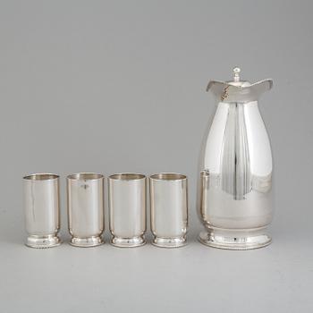 a 5-piece set of a silver jug and four silver glasses.